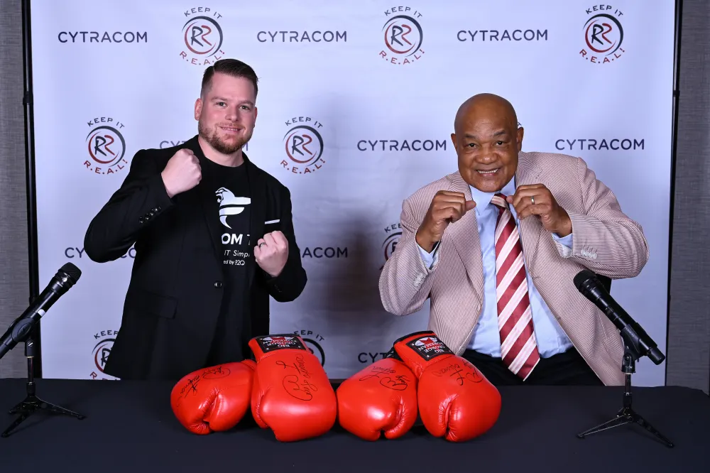 Matt Jones with George Foreman