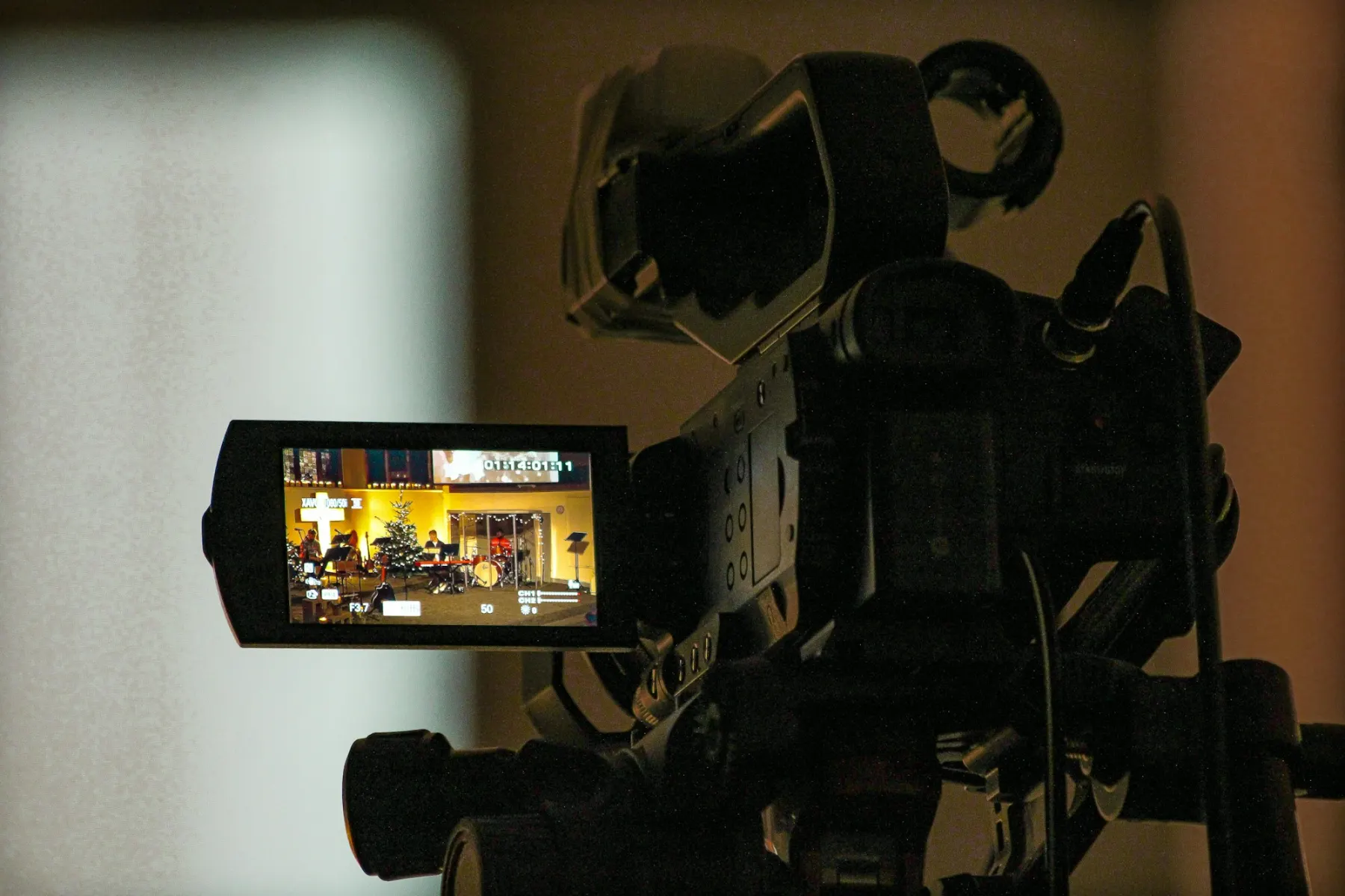 Livestream camera recording a worship service on stage